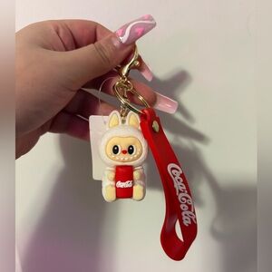 Coca-Cola Red & Cream Mascot Keychain with Red Logo Strap